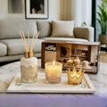 طقم مبخرة عطر و كاسات شموع على لوح خشبي صغير